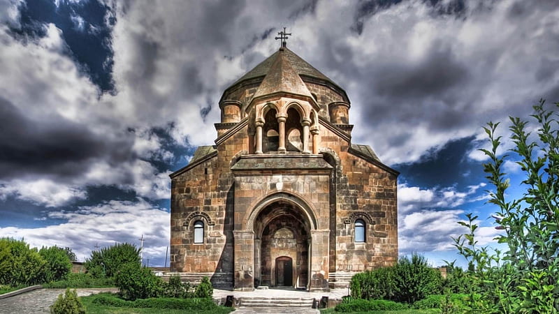 Hripsime church in Armenia-r-stone-r-church-clouds-bushes